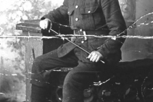 149: Denis Reddy. The emblem on the shoulder says ""Nfld"". Written on the back ""To Mrs.  Reddy from John J. Whelan"" (circa 1918)  ** Note. The person in the photo has also been identified as being John J Whelan.**  - son of James Reddy &amp;amp; Mary Anne Murphy